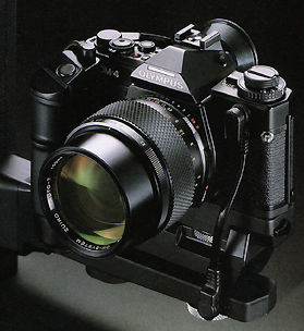 100mmf2flashsetup.jpg (33k) Loading ...