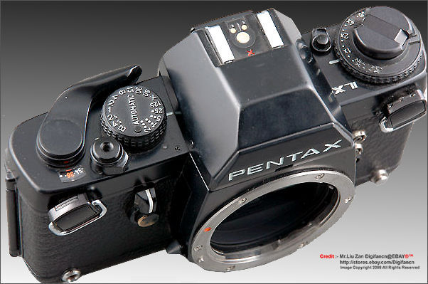 Pentax LX professional SLR camera body top plate section for various camera controls