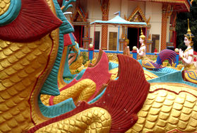 External decorative dragons and statues at Wat Chaiyamangalaram (Wat Chai) Thai Buddhist Temple