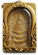 Thailand gold encased amulet