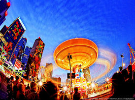 Spinning wheels in the sky at night fall